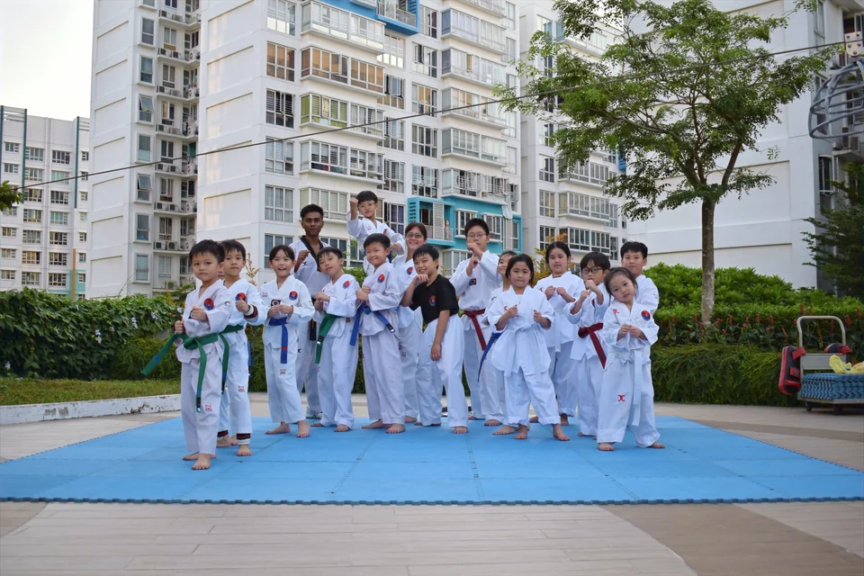 Momentum Taekwondo group photo taken during their Taekwondo training in Singapore