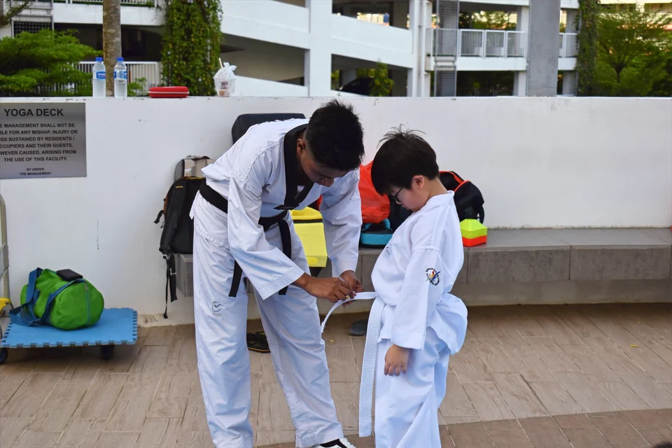 Momentum Taekwondo students and coaches in Singapore