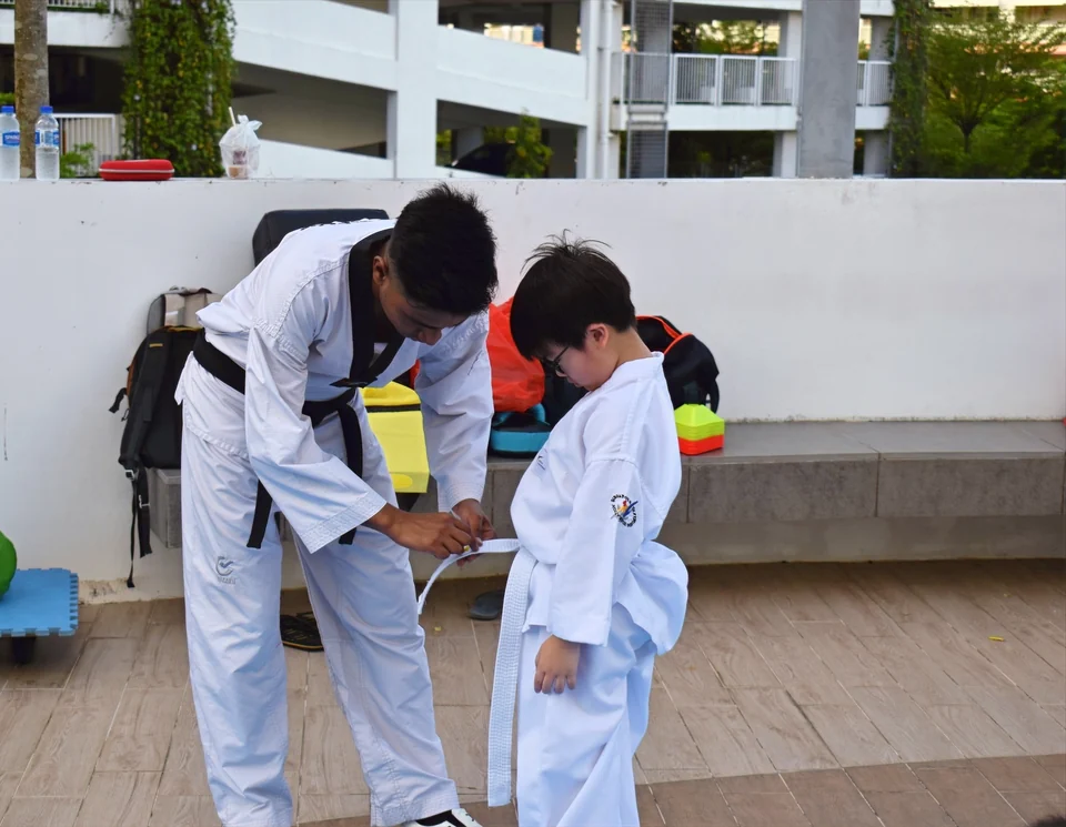 Momentum Taekwondo students and coaches in Singapore